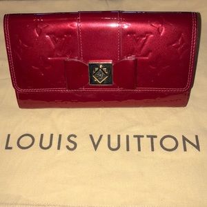 Red patent leather Louis Vuitton wallet